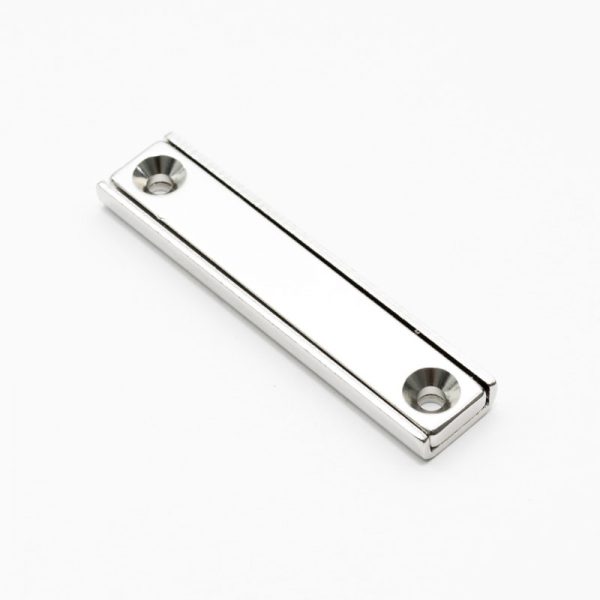 Magnet v pouzdře s dírami pro šrouby 60x13,5x5 mm