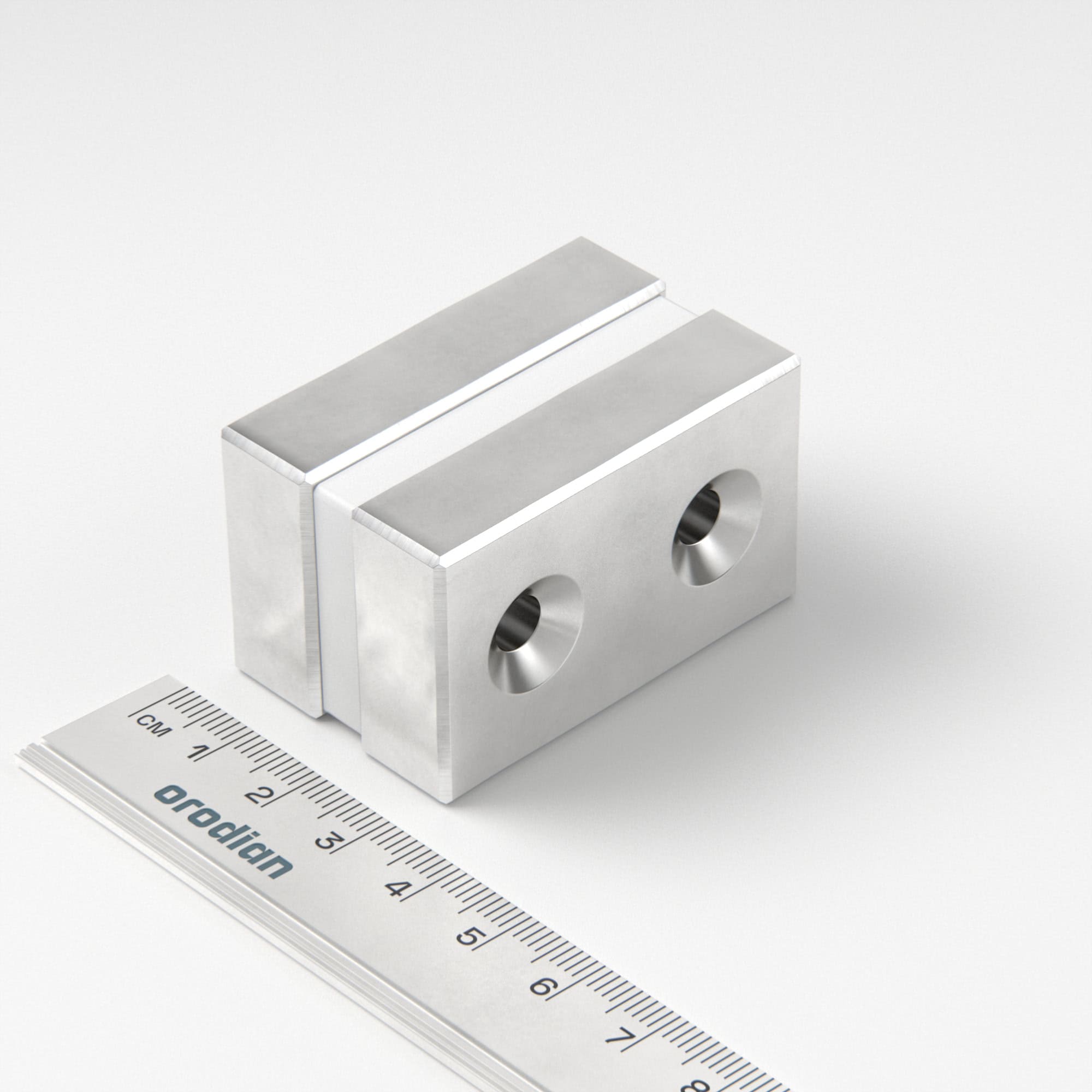 Neodymový magnet kvádr 50×30×13 mm s 2 dírami M6 (jižní pól na straně s prohlubněmi) - N45
