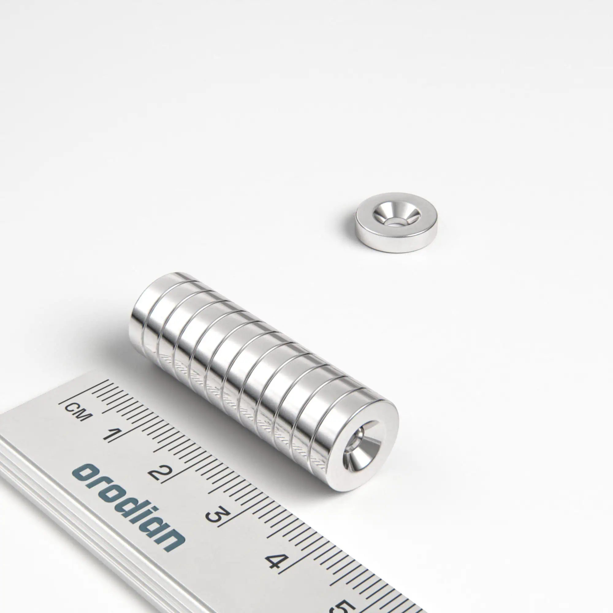 Neodymový magnet válec 12×3 mm s dírou M3 (jižní pól na straně s prohlubní) - N38