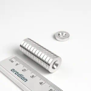 Neodymový magnet válec 14×3 mm s dírou M4 (jižní pól na straně s prohlubní) - N38