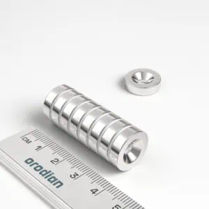 Neodymový magnet válec 15×4 mm s dírou M4 (severní pól na straně s prohlubní) - N38