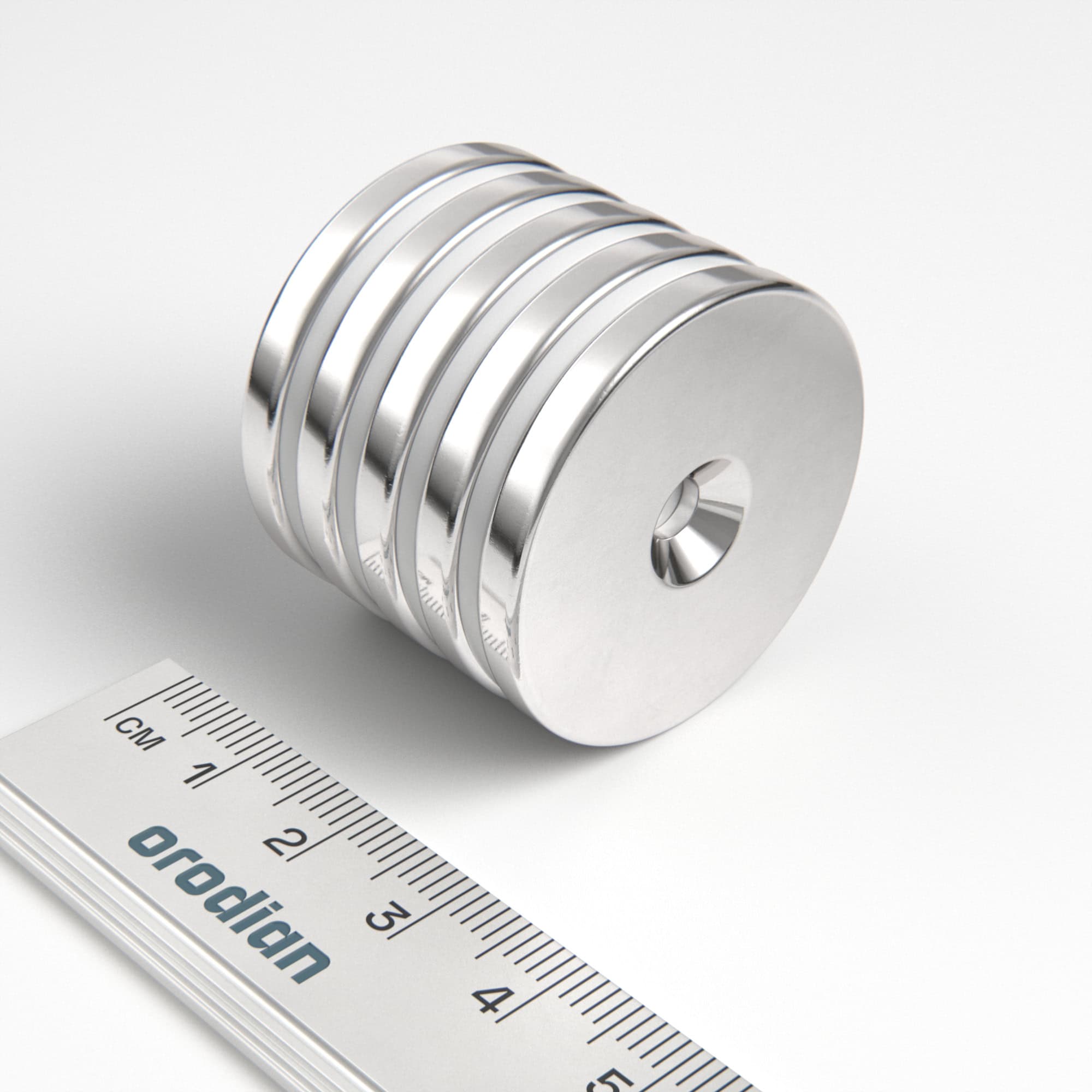 Neodymový magnet válec 34×4 mm s dírou M4 (severní pól na straně s prohlubní) - N38