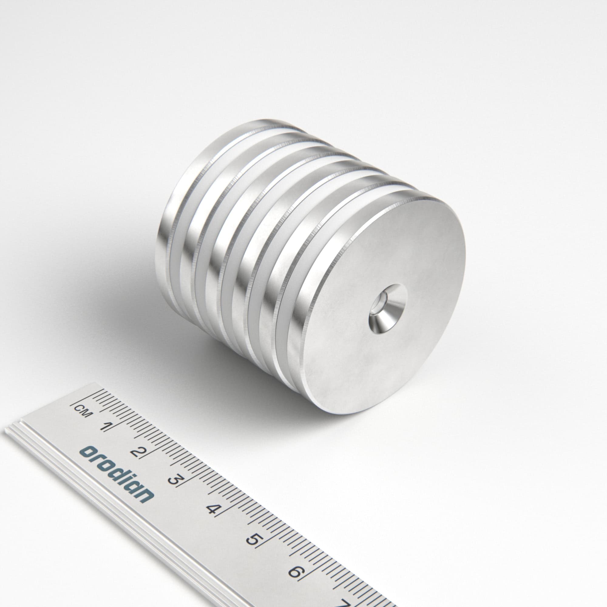 Neodymový magnet válec 42×4 mm s dírou M4 (jižní pól na straně s prohlubní) - N38
