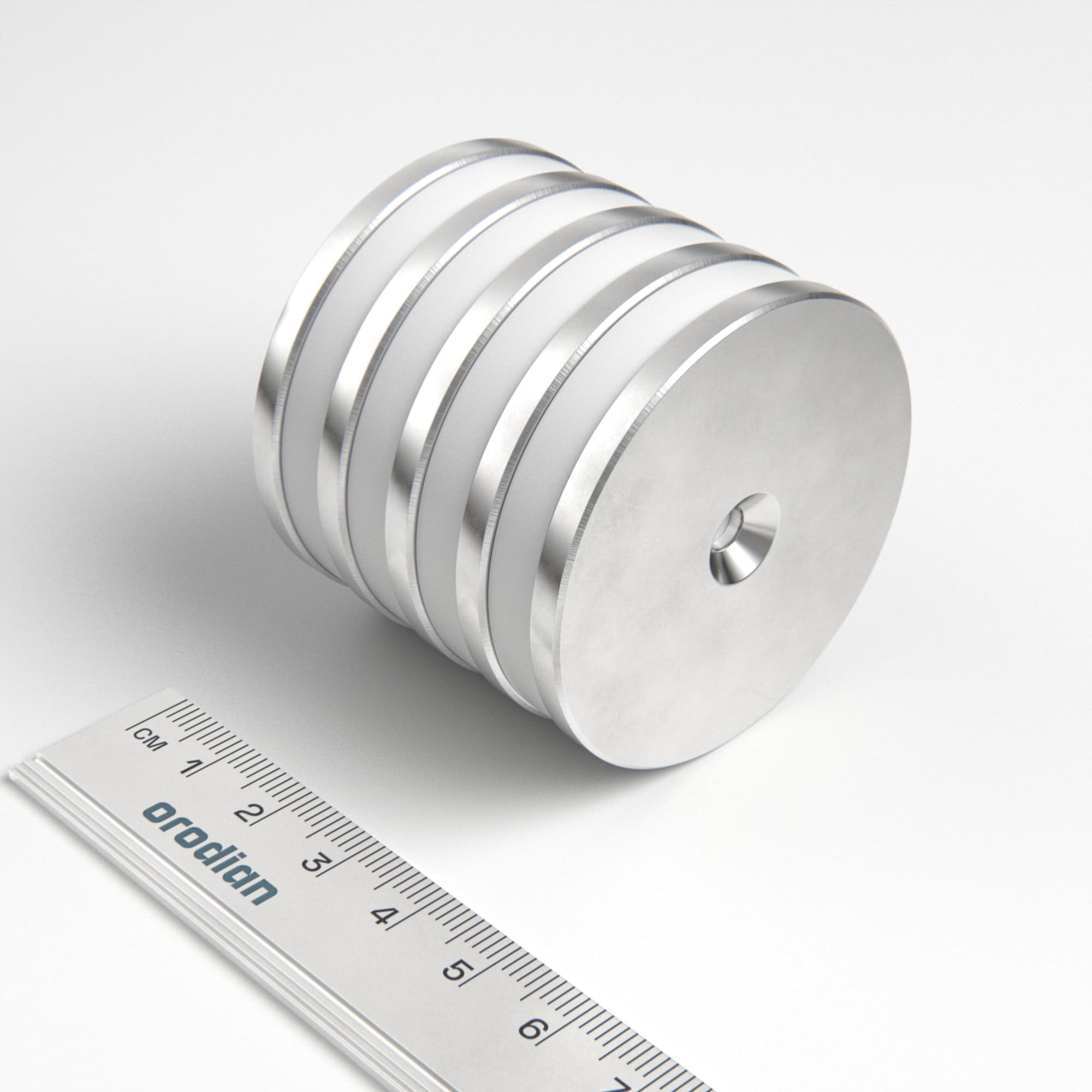 Neodymový magnet válec 50×4 mm s dírou M4 (severní pól na straně s prohlubní) - N38